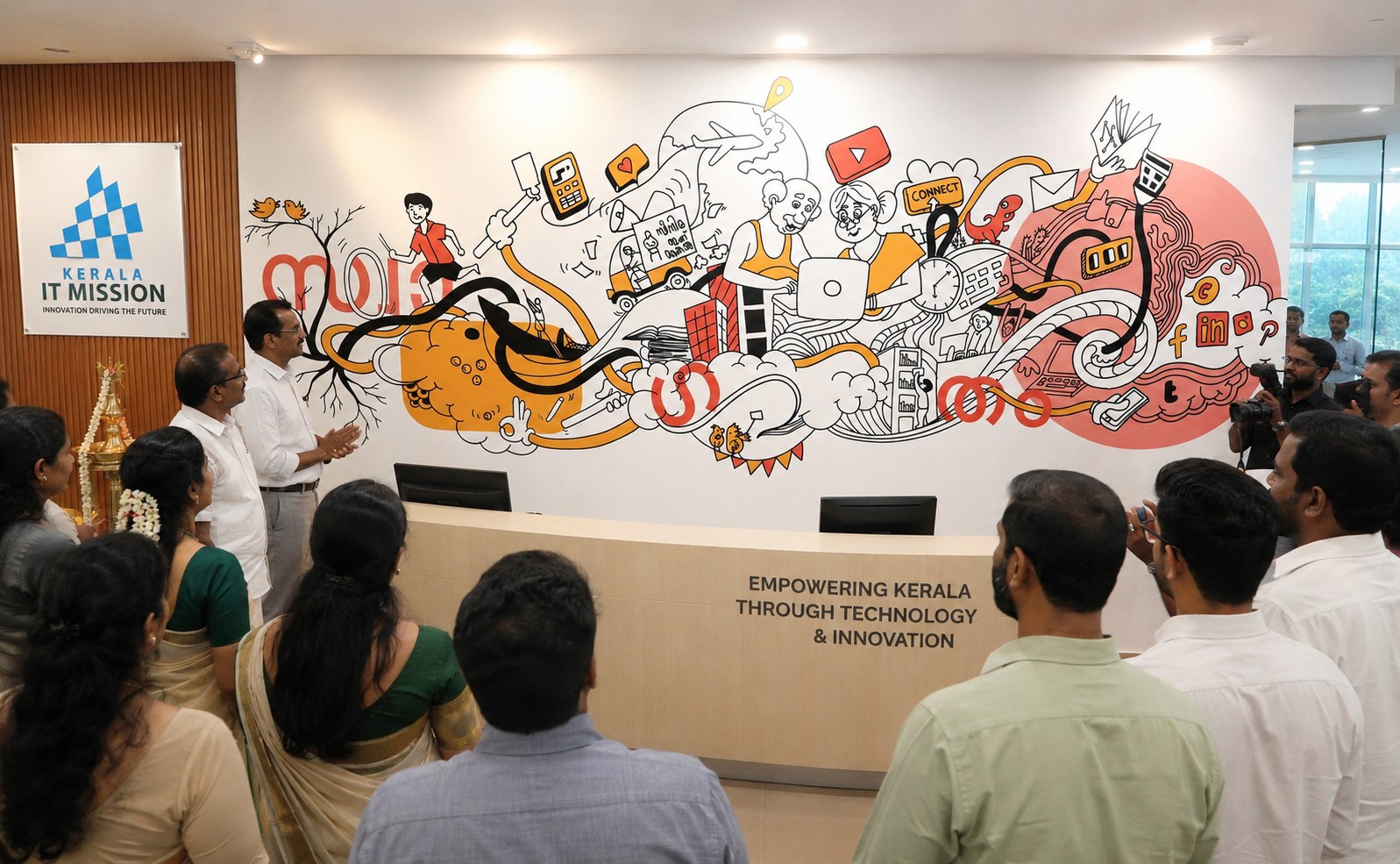 A large hand painted mural at the Kerala State IT Mission building, showing icons of connection, technology and community, unveiled at the building's launch event.